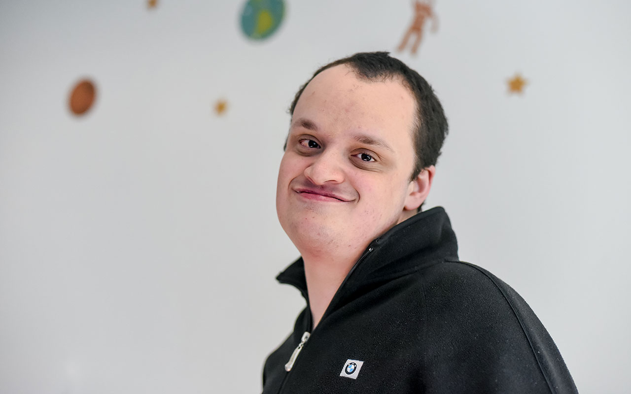 Adult man smiling at the camera