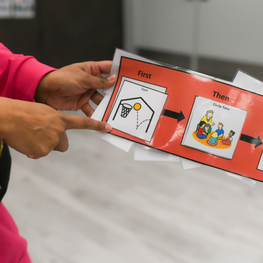 kids in classroom playing with musical instruments